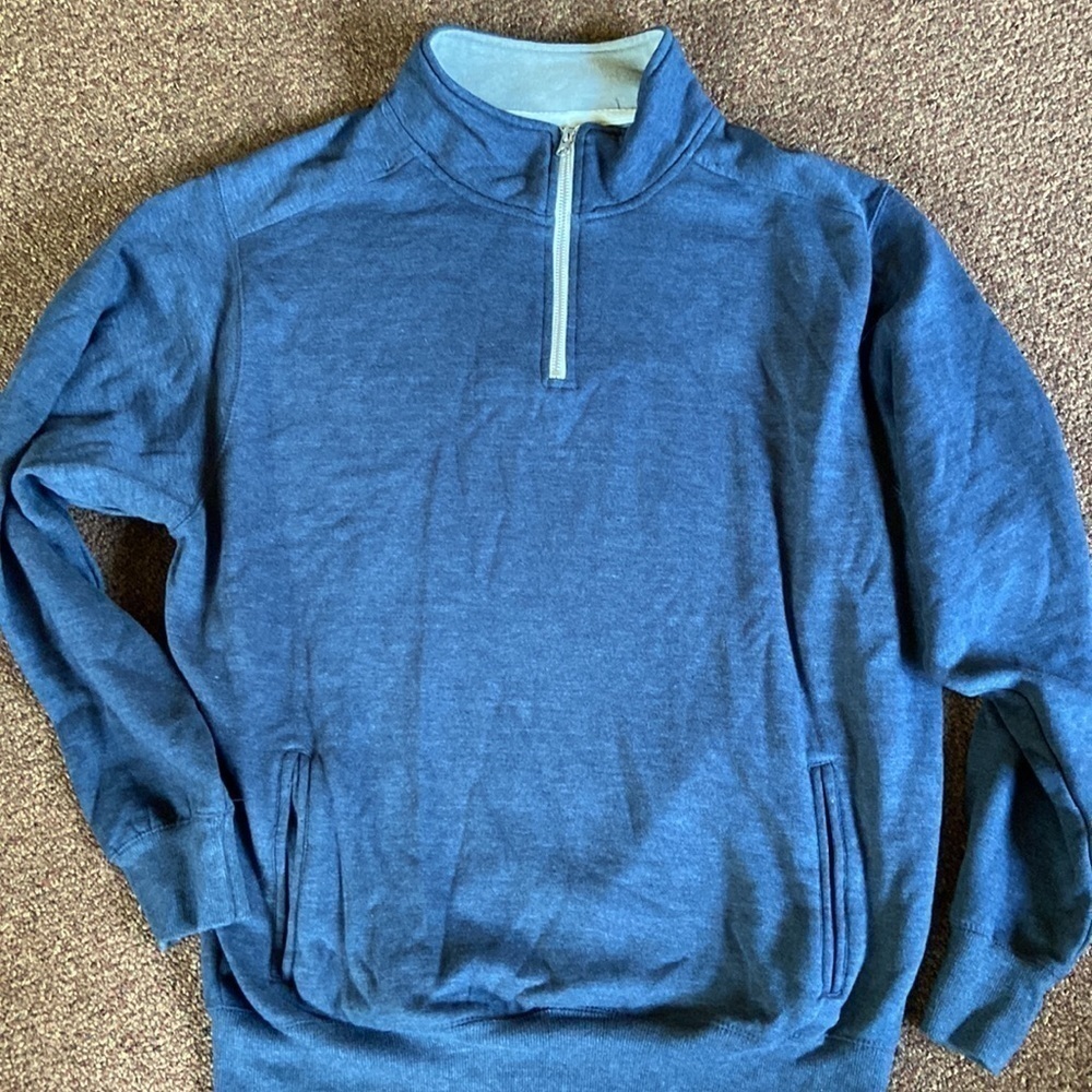 PENNANT Sportswear flannel sweatshirt has zipper to mid chest and big pockets.